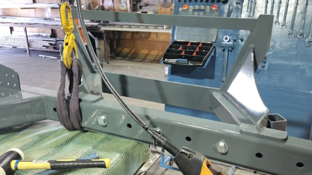 <p>Hoist up hitch frame and bolt onto main chassis</p>
