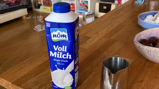 <p>Prepare the milk and the metal frothing jug. Ensure the jug is clean and ready for steaming.</p>
