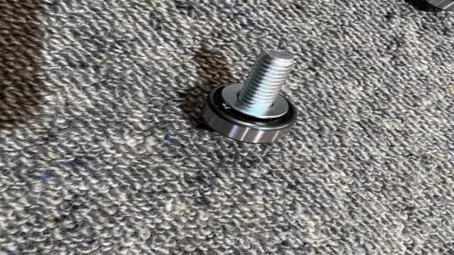 <p>Bearings should have one washer underneath it to prevent binding</p>