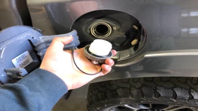 <p>Release fuel, remove cap</p>