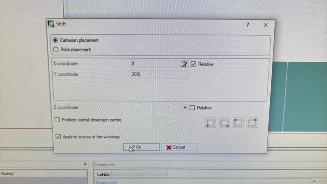 <p>Enter 0 in the X axis and enter 200mm in the Y axis ensure "Apply a copy of the workings" is ticked.
This will create a copy of everything selected &amp; move it 200mm up.</p>
