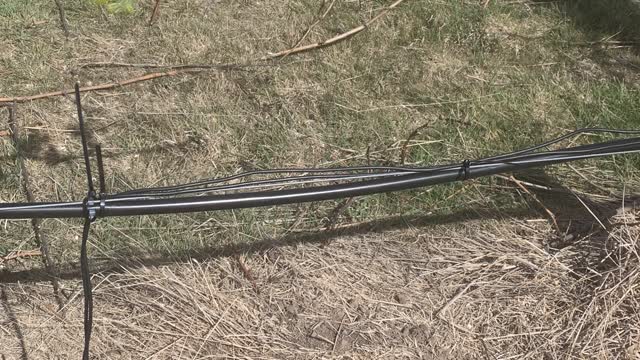 <p>Cable tie the cables back to the unit to the wire or dripper pipe.</p>
