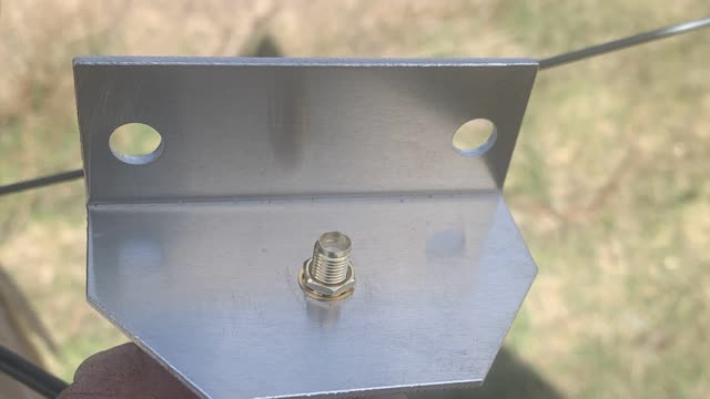 <p>Push both aerial connections through the brackets and put the nuts on.</p>
