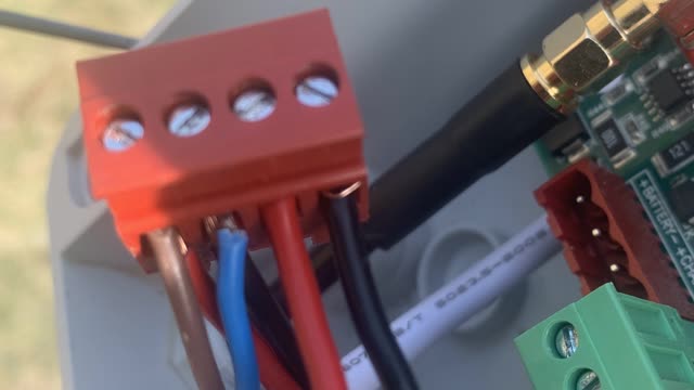 <p>Wire them into the red connector like this.
Red to the left.
Black on the right hand end.</p>
