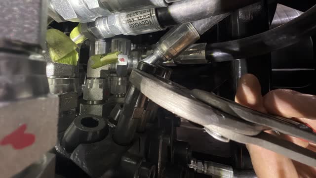 <p>Remove cap on hoist pressure limiter</p>