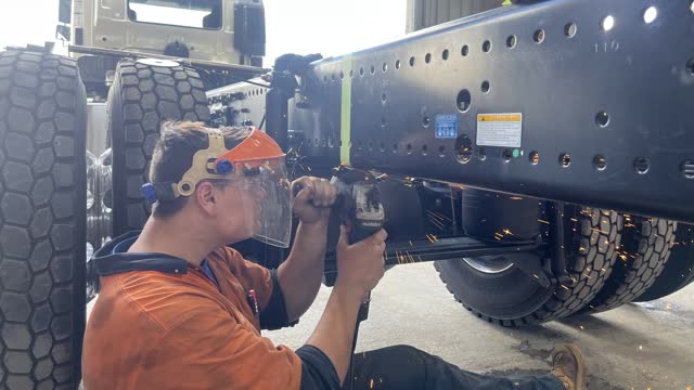 <p>Using an angle grinder and correct PPE, cut excess chassis starting at the bottom working your way up.</p>