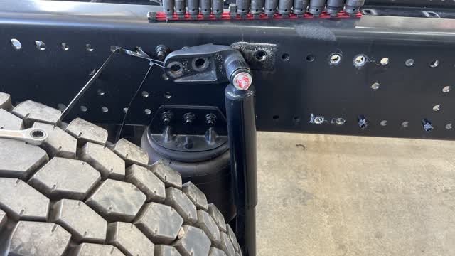 <p>Cable tie shocks out of the road to allow room for Magnet drill.</p>