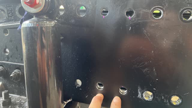 <p>Photo of which 4 holes needed drilling.</p>