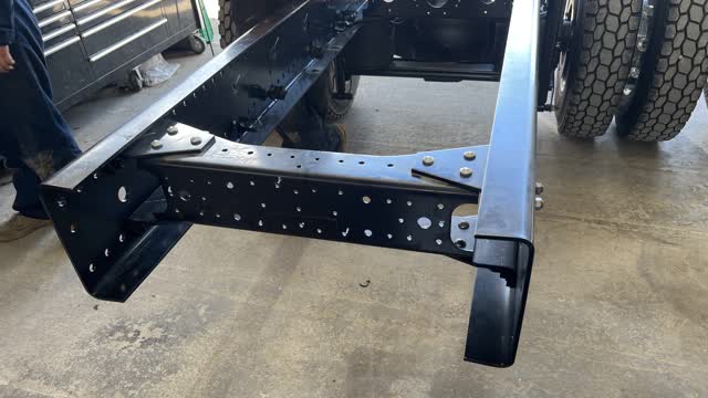<p>Remove rear crossmember and plane in the steel bin.</p>