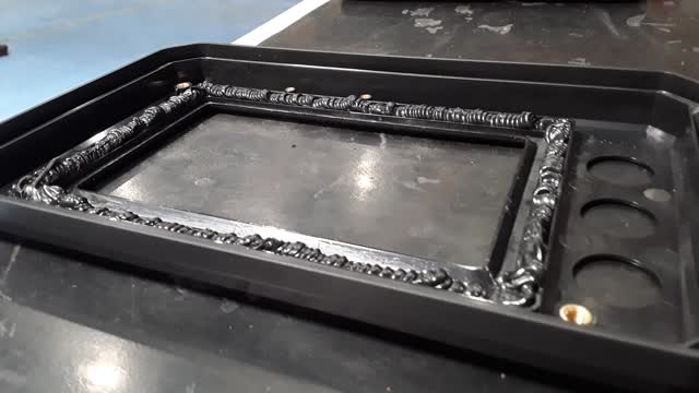<p>Cover the first channel with a generous amount of black glue, then place the screen so it aligns with the edges of the channel.Ensure the glue spills over into the second channel for full coverage. Tip: Let the glue dry for at least one and a half days, Once dry, cut away any excess glue.</p>