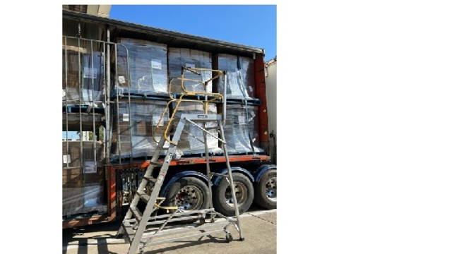<p>Standing on trailer decks and throwing the buckle end of webbing restraints is NOT ALLOWED on site. Platform ladders are available for the correct placement of webbing restraints.</p>