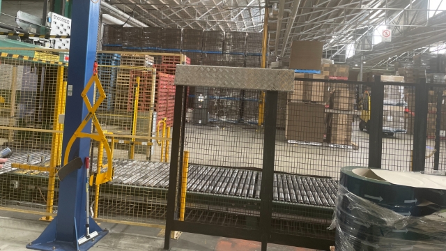 <p>Stow the crane /clamp in the 'Home' position, which is flush against the strapper line frame barrier.</p>
