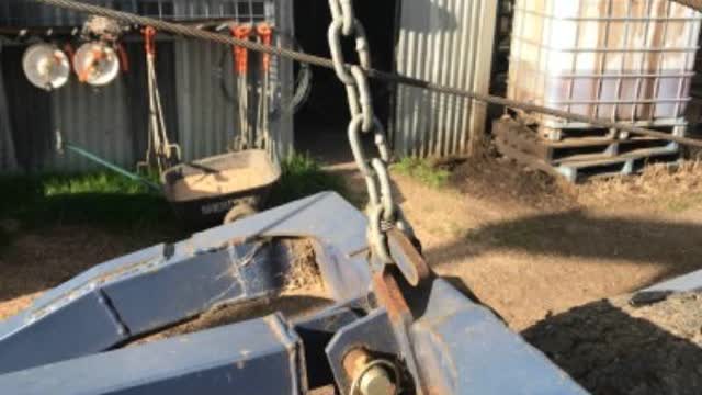 <p>Unwind ratchet until slack is taken out of chain</p>