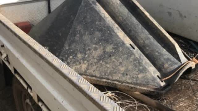 <p>Put hopper bin on back of vehicle</p>