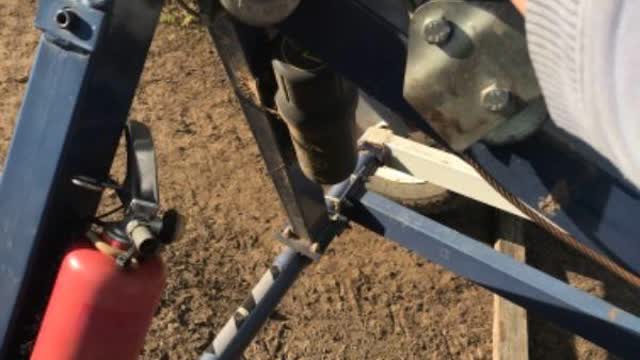 <p>Unhook cable off rear axle unit</p>