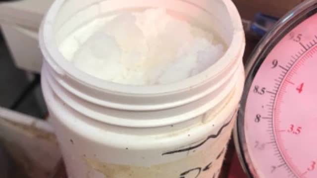 <p>Get one full cup of powder in cup that’s in the bucket</p>