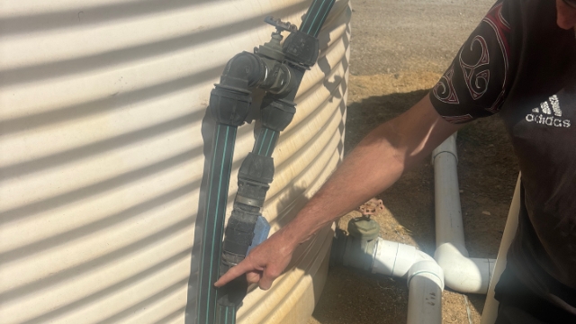 <p>The line pointed to is the specific dam tank fill line that comes from DAB pump around flood wash and to dairy. The valve behind it (see step below) flows to dairy ring main</p>