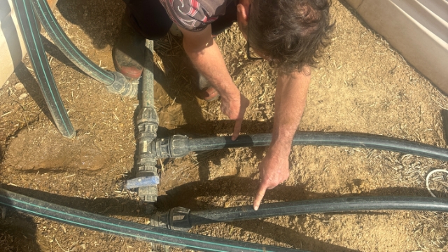<p>These two lines go to the tank closest to Deloraine and provide portable water to dairy. The front line is inflow to tank the line closest to Grant is the line from the tank to dairy. The valve in the middle is the emergency line so if there’s a failure you can run bore water direct to dairy</p>