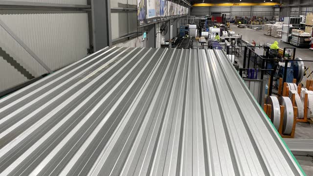 <p>Lay roof sheets out onto roof overlapping at the join line the sheets up with the front of the main header.</p>
