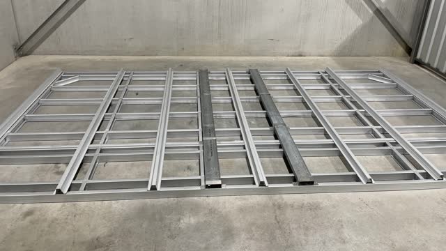 <p>Layout the 7 of 64mm top hats evenly across the frame and screw off. Using two screws per floor joist.(14 screws per top hat)</p>
