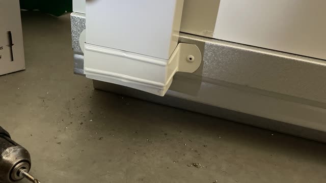 <p>Attach down pipe brack to the back of the shed and around the down by drilling holes and pop rivitong and pop rivit the sides to stop it from slipping.</p>
