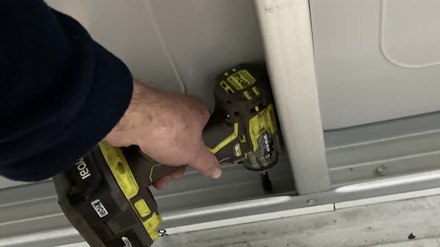 <p>Screw wall 5 to the floor using two text screws per segment.</p>
