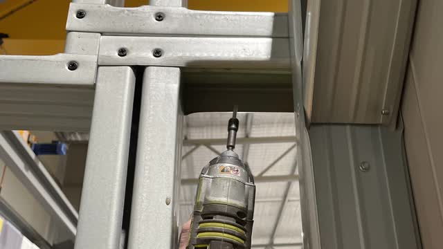<p>Screw the header off to the man in position shown in photo using two tech screws on the left-hand side of the header and the right-hand side of the header.</p>
