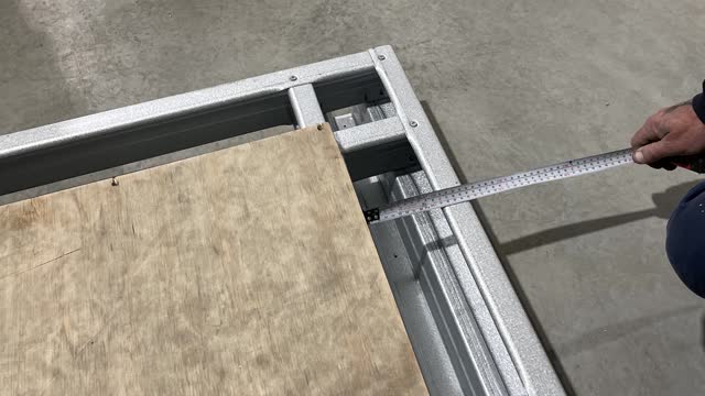<p>Fit first sheet of ply ensuring that there is 150 mm around each edge of the ply.</p>
