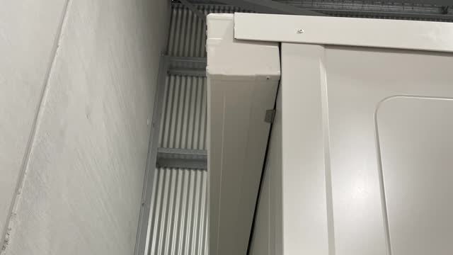 <p>Attach gutter to the back of the shed.</p>
