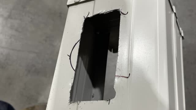 <p>Create an opening in the bottom of your gutter so you can insert the gutter holder.</p>
