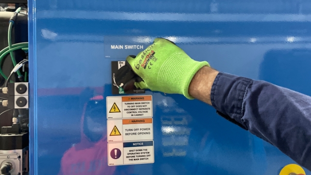<p>At the back of the machine, turn the main switch ON.</p>

