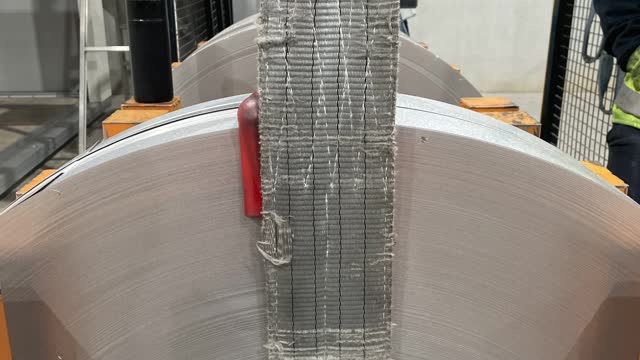 <p>Add the sling and connect it to the crane, Raise the crane slightly to make sure the sling is straight.</p>