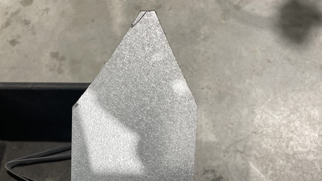 <p>Using the grinder cut the end of the coil into a near triangle shape.</p>