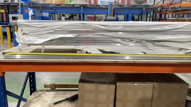 <p>Grab your bottom rail and measure it to make sure it is the right length, if its too long use the drop down saw to cut it to the length you need.</p>