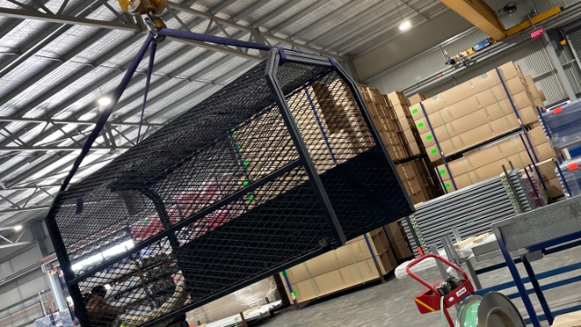 <p>Carefully move the cages away from the machine.</p>