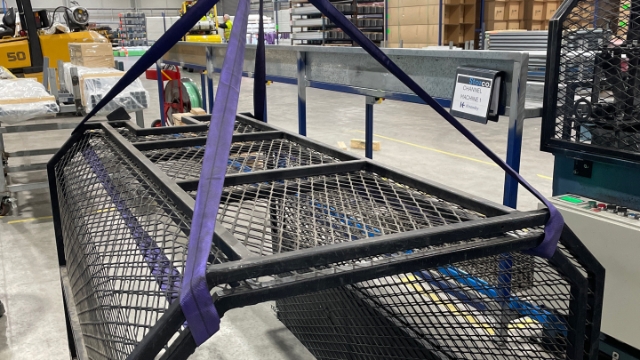 <p>Lift the cages and bring them over to the machine. Repeat for all cages.</p>