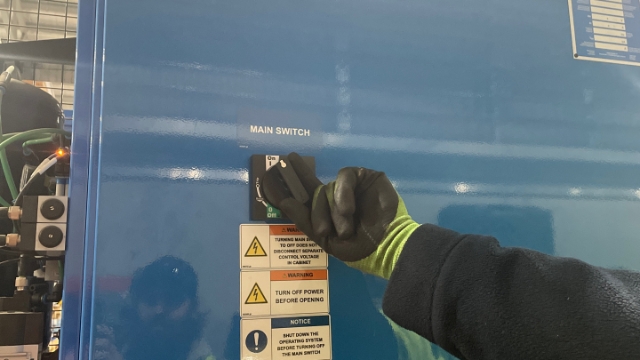 <p>Turn OFF the other main switch at the back of the machine.</p>