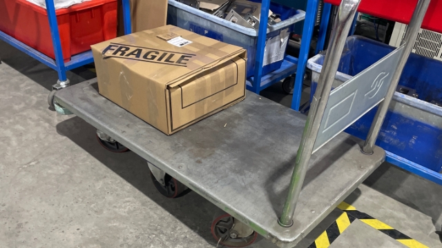 <p>After everything has been assembled, put it in a box. 50 swing door locks to a box, 100 roller door locks to a box. Tape it closed, put on a signed QA sticker, write the amount on the box and take it to stores.</p>