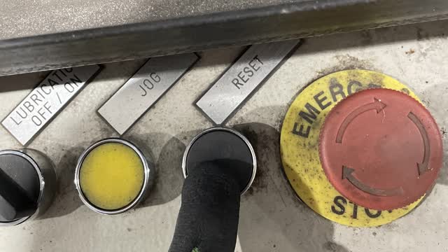 <p>Press the black Reset button located on the console to reset the machine.</p>