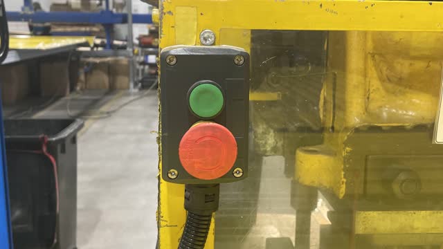 <p>Press the green button to turn hole punch ON.</p>