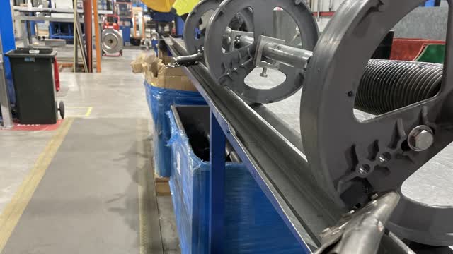<p>Move the shaft to the lip of the table, making sure the lip of all three wheels are flush with the lip of the table, then clamp the outer wheels to the table.</p>