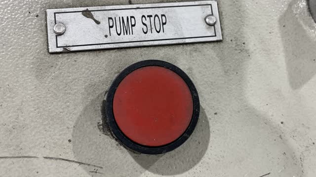 <p>Press the red Pump Stop button.</p>
