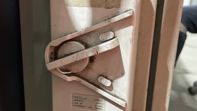 <p>Turn the main isolater switch (power switch) to Off.</p>
