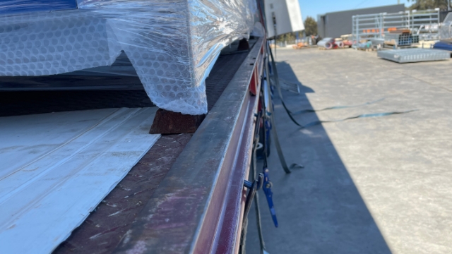 <p>Make sure the stillage feets are not on the lip of the truck bed and fully inside.</p>