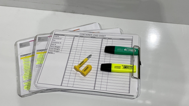 <p>Tools required: Forklift, Cage, Rope, three clipborads (Job trackers and Container Load Sheet), yellow coloured highlighters, one unique colored highlighter which is not used before for that job and a seal.The Container Load Sheets and seals are kept in Logistics Coordinator's drawer. If you run out, you can print the Container Load sheet and seals will be stocked in Stores.</p>