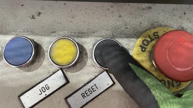 <p>Press the black Reset button to reset the machine. You should hear a slight click noise.</p>