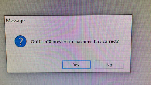 <p>The machine will ask the above. This is to check that the winding handle is not in the machine. This can been seen through the window as shown in the picture on the next step</p>