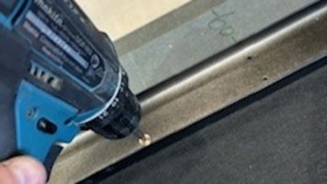 <p>Screw batten to the slats until clutch engages on the drill</p>