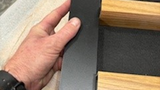 <p>Turn panel over & use a straight edge to check all slats are even & the face of the panel is fee from defects</p>