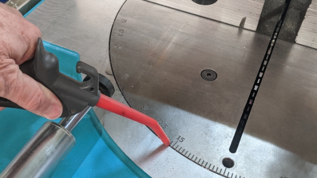 <p>Ensure all swarf (aluminium shavings) are removed by using compressed air to blow out the turn table carefully.</p>